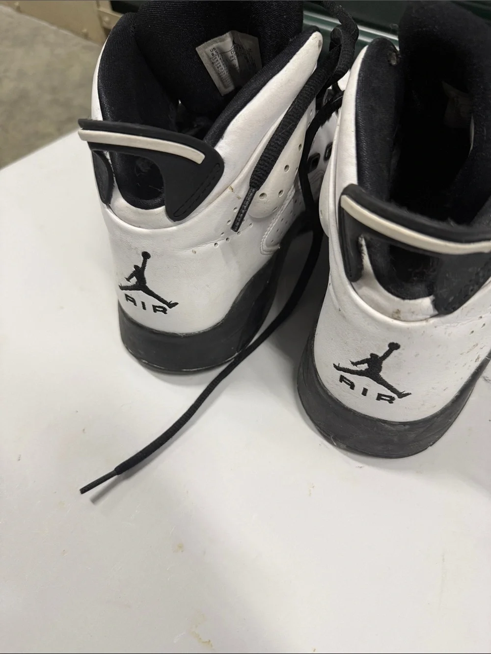 White and Black High-Top Athletic Sneakers